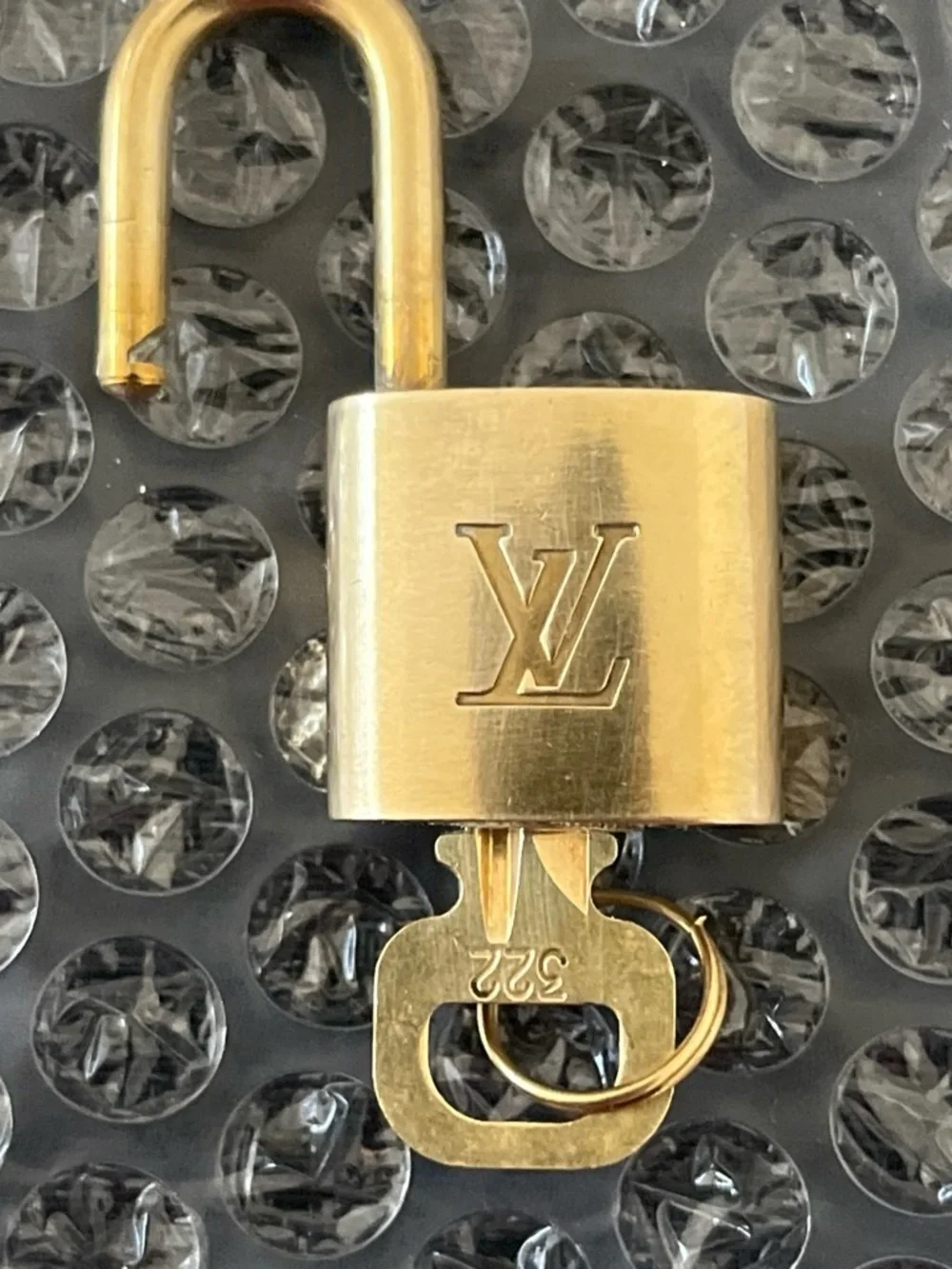 Louis Vuitton polished gold